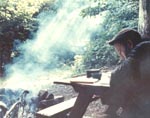 Dan McCracken reading at a lean-to on the Appalachian Trail.