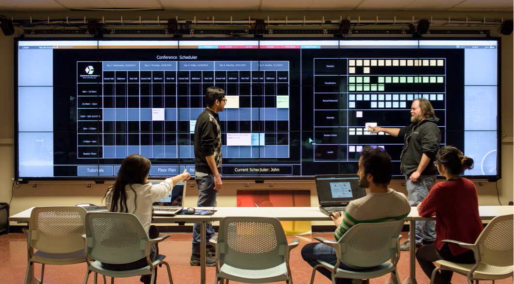 StickySchedule: An Interactive Multi-user Application for Conference Scheduling on Large-scale Shared Displays