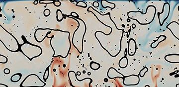 Droplets alter turbulent heat transport