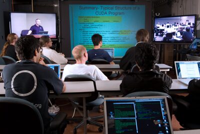 High-Definition Telepresence Bridges University of Illinois Campuses for Summer School on Petascale Computing