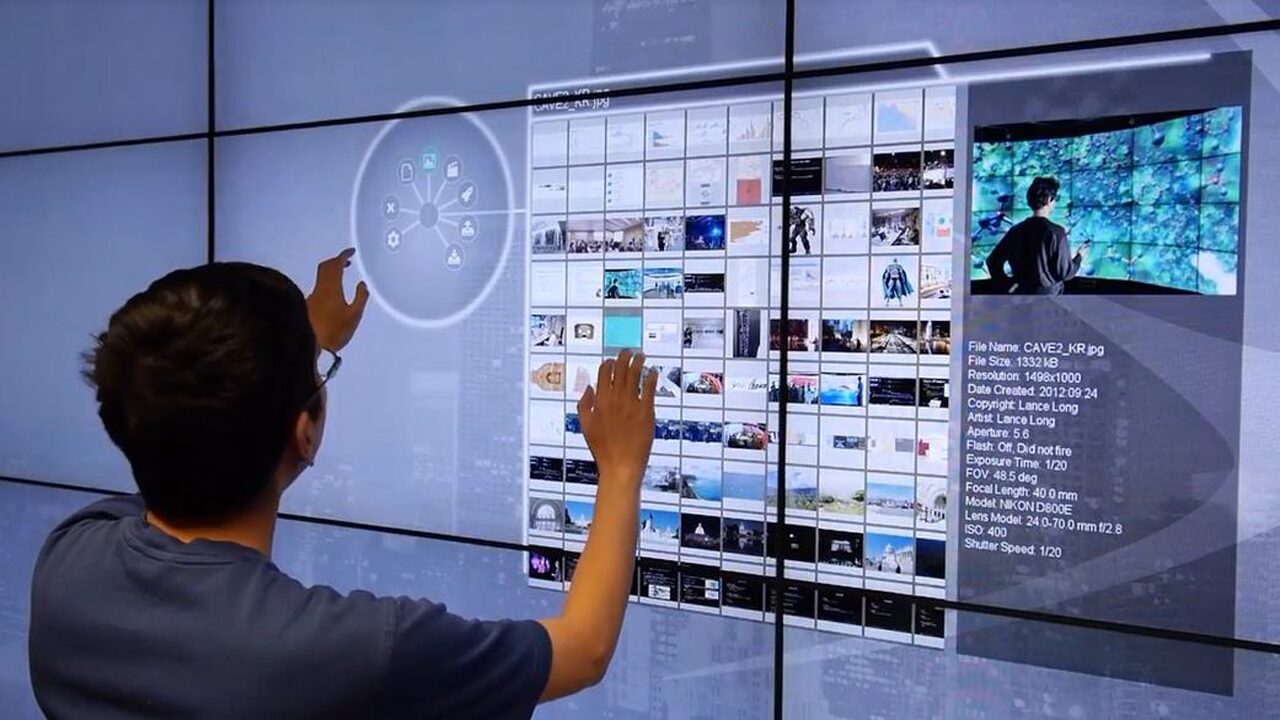 SAGE2 Multi-User Touch Centric Interface  and Unity3D in CAVE2: First Steps in a More Interactive Virtual World