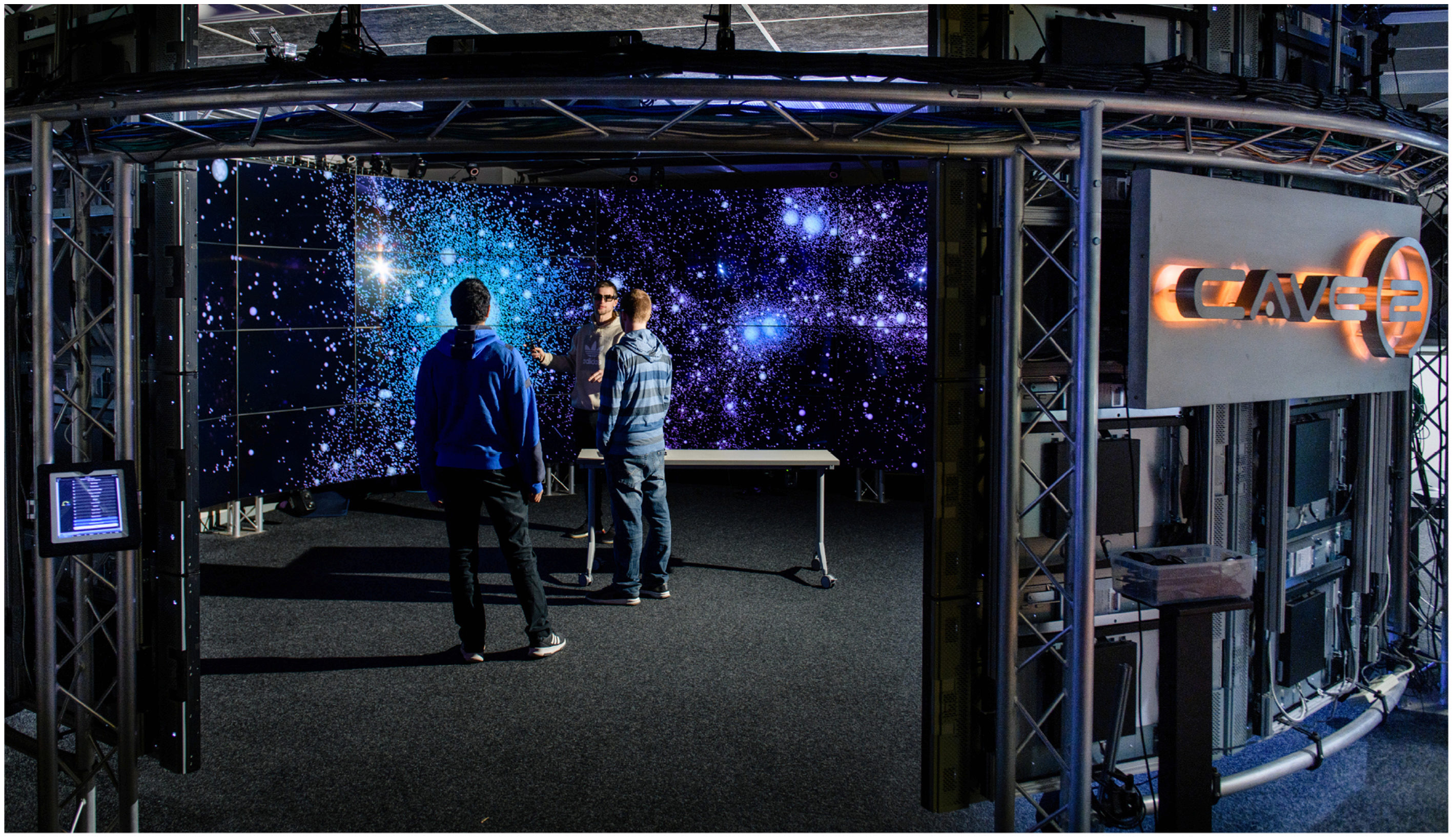 Collaboratively examining in an immersive environment the formation of dark matter halos.