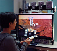 The Varrier AS VR system is shown in the smaller desktop version on the Personal Varrier system