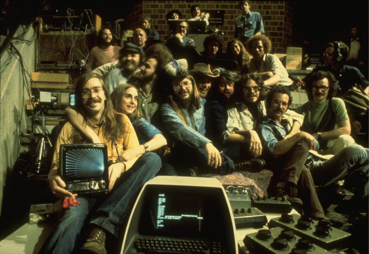 Dan Sandin (center, with feathered hat), with other participants in live computer video performance at Electronic Visualization Event 2 in Chicago.