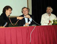 The symbolical opening of iGrid2002. From left to right: Maxine Brown (UIC), Kees Neggers (SURFnet) and Cees de Laat (UvA)
